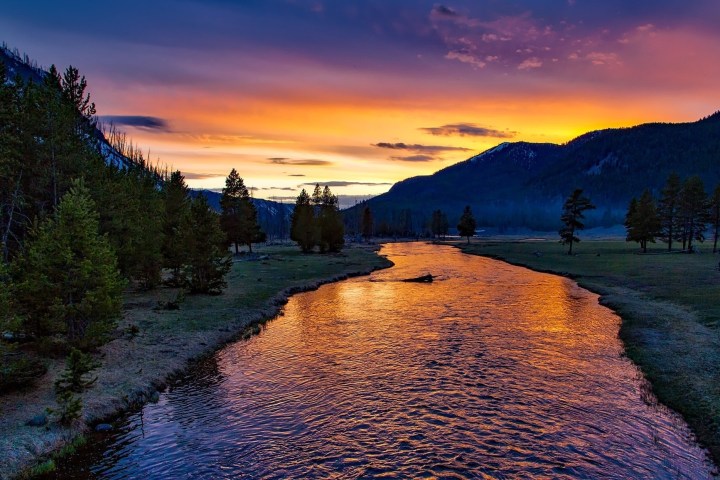 a sunset over a body of water